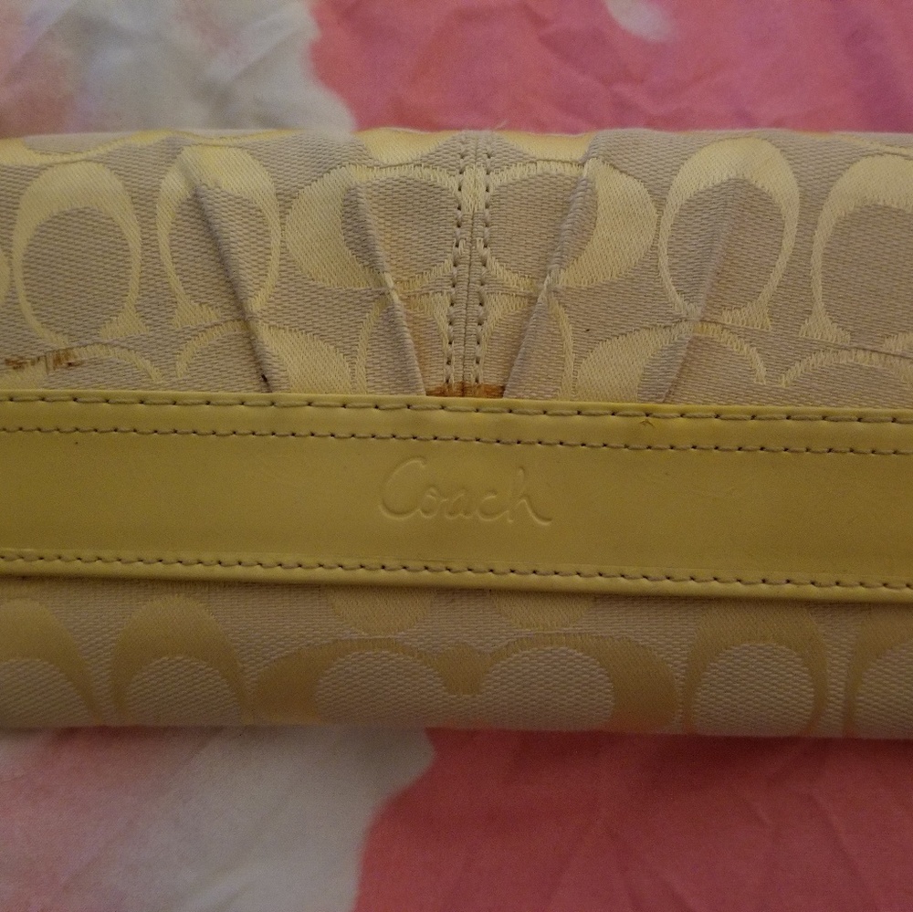 REDUCED MUST GO Yellow coach embroidered wallet